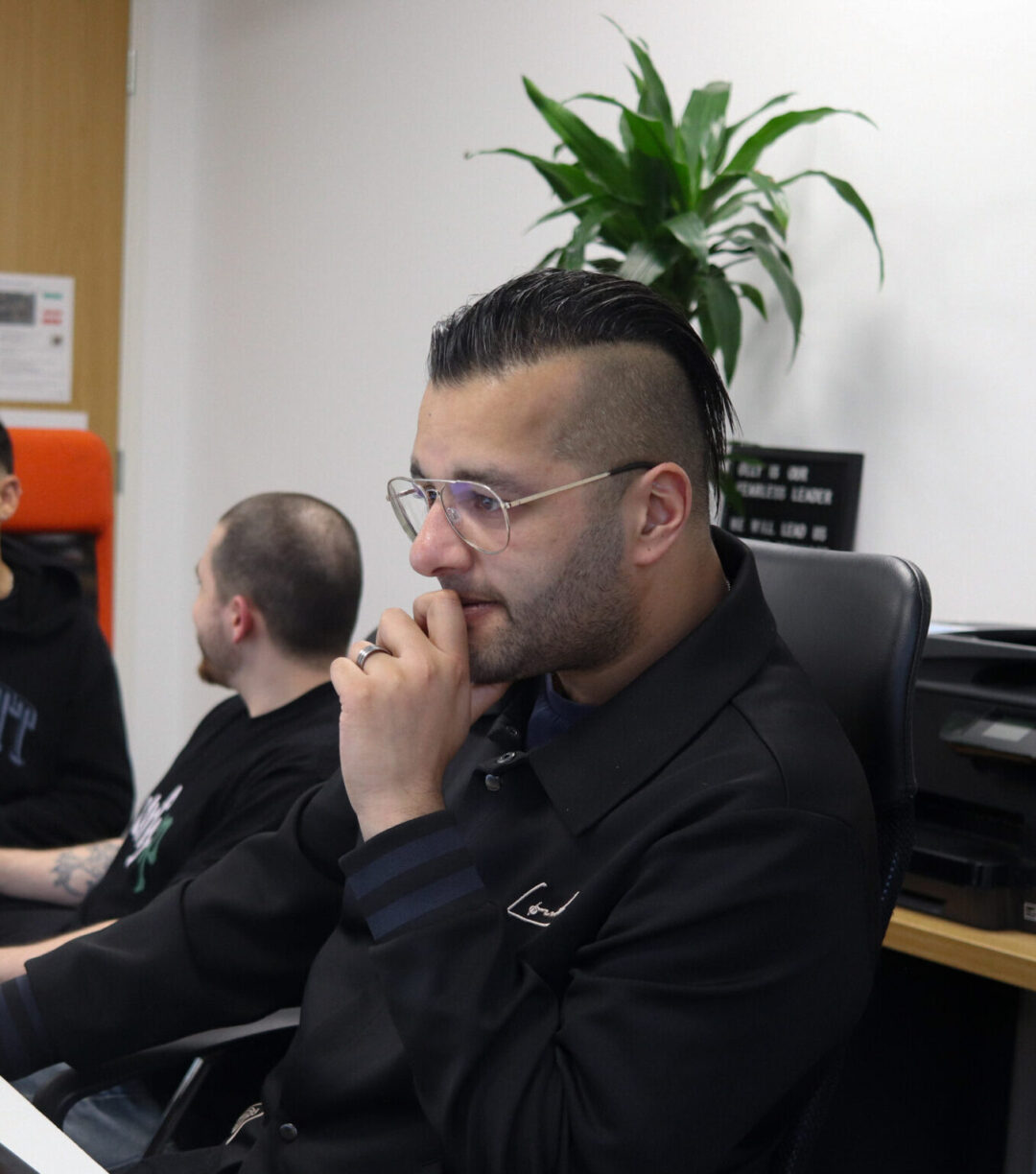 Repeat Digital team member working at their desk