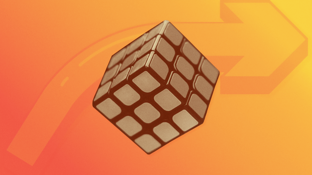 Rubik’s Cube on orange background representing creative problem-solving and strategic digital marketing solutions