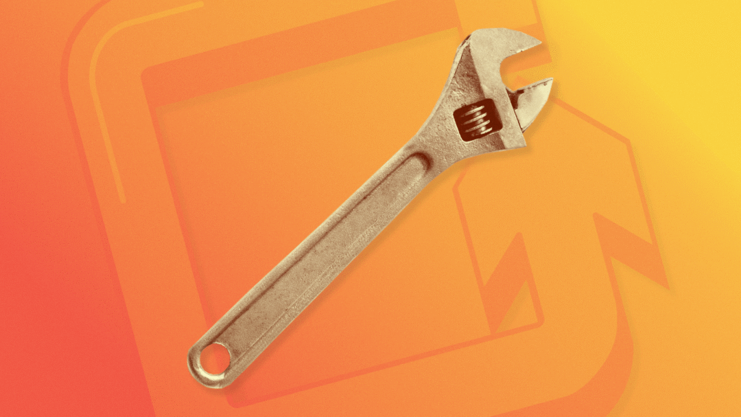 Adjustable wrench on orange background representing optimisation and fine-tuning in digital marketing performance