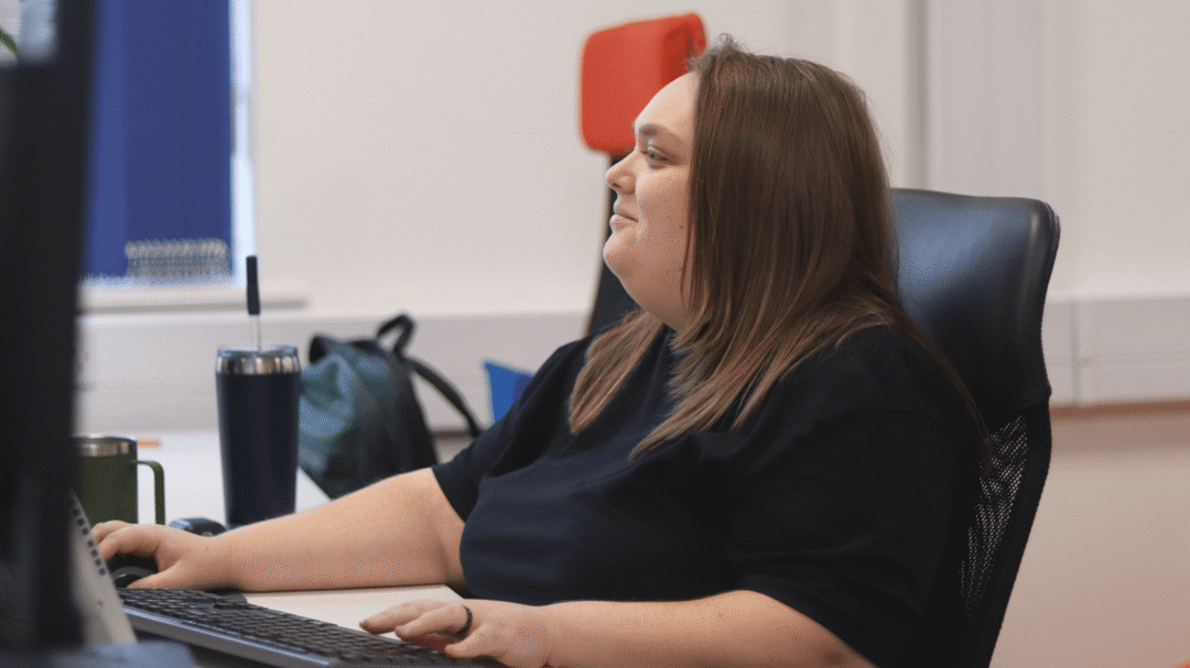 Repeat Digital team member working at their desk in the Nottingham office